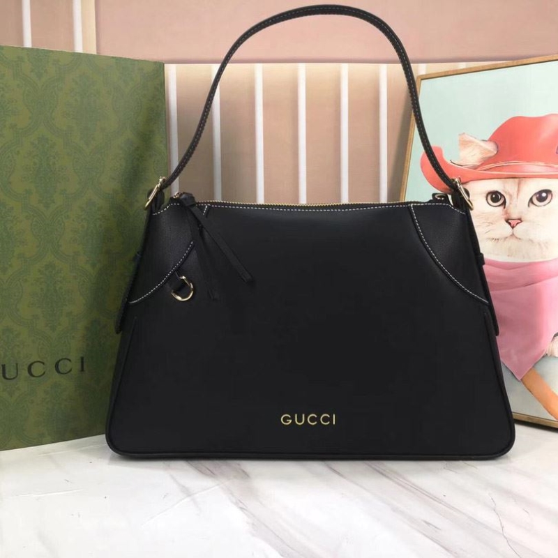 G*u*i top handle bags